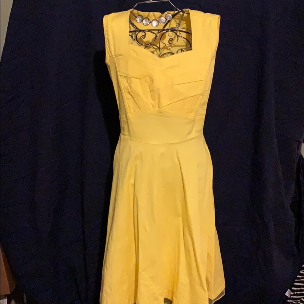 Yellow dress with small front detail